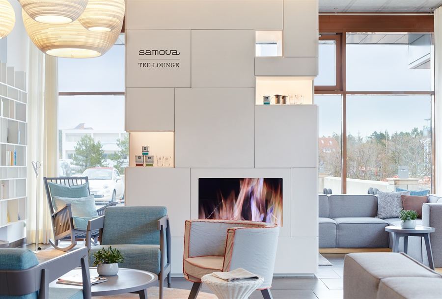 Tee-Lounge mit Kamin im StrandGut